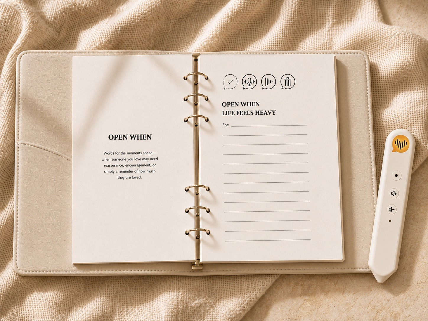 The CoHear journal opened to an Open When letter page beside the cream voice recorder on soft fabric